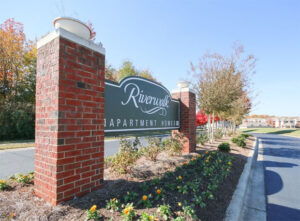 The sign into the Riverwalk Apartments.