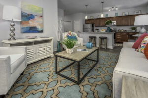 A stylish living room and kitchen area.