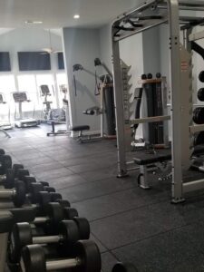 A selection of treadmills, weight lifting equipment and other exercise equipments.