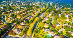 A view of a wide, comfortable suburb.