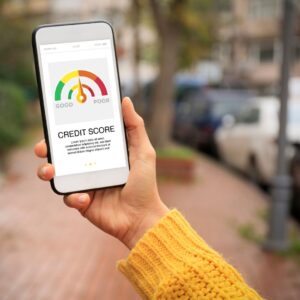 person looking at credit score on mobile screen