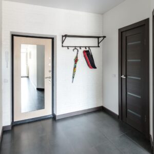 Room with mirror on door