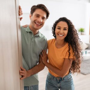 happy couple in apartment