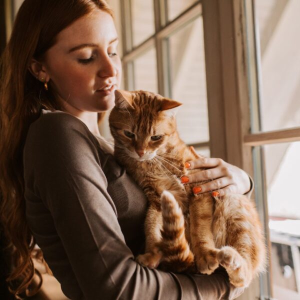 img of a woman and a cat